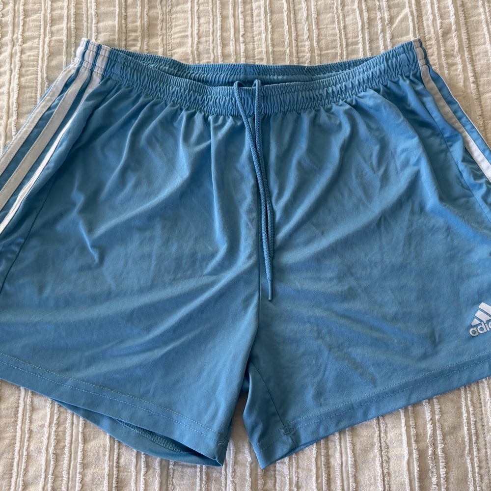 Women’s Adidas Light Blue Athletic Shorts with White Stripes